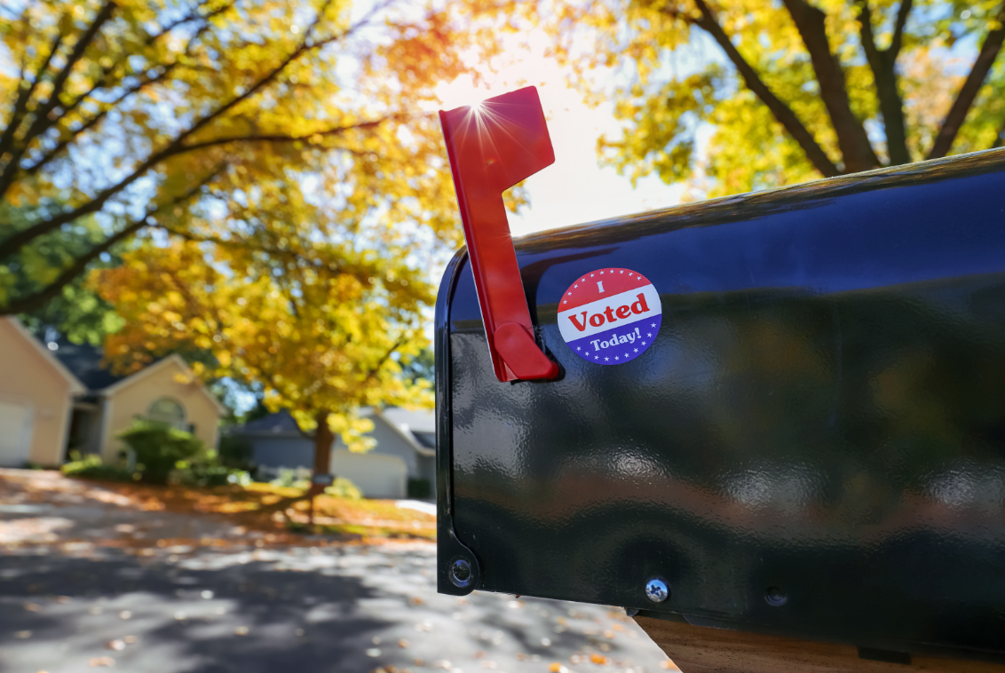 img - mailbox with I voted Today sticker on it