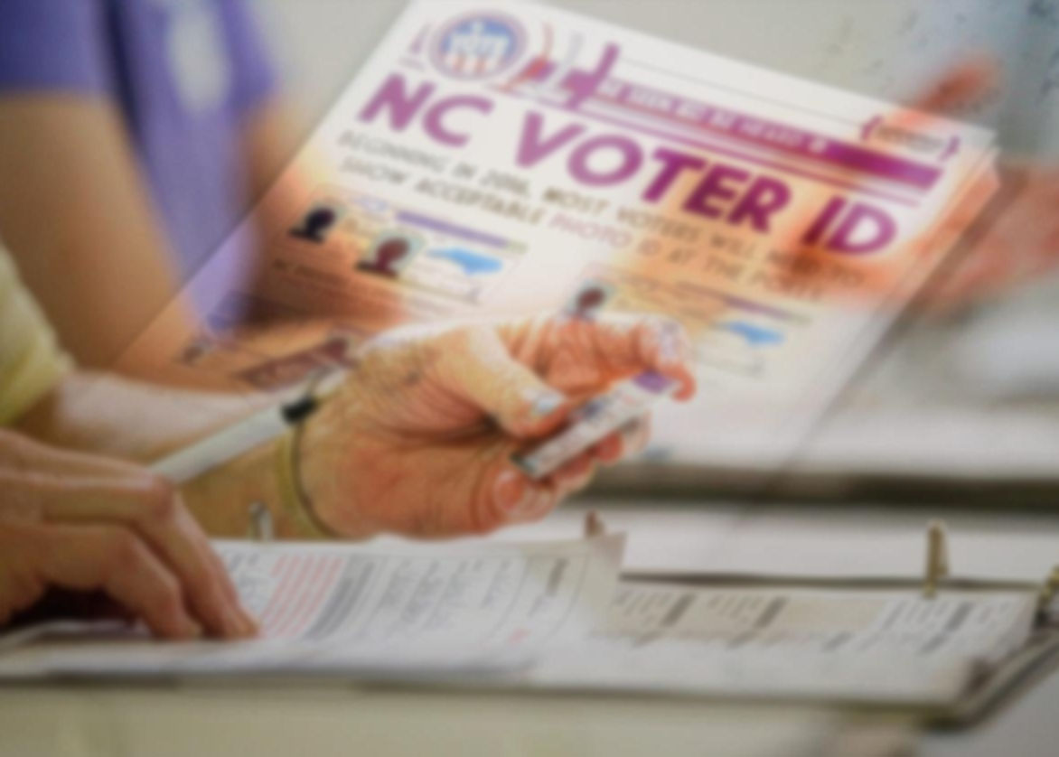 VoterIDFlyer_blur Voter ID flyer with hand holding an ID.